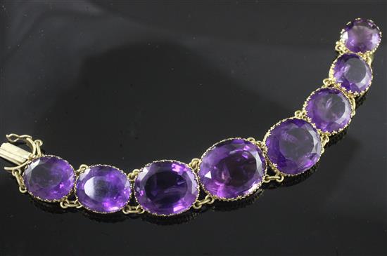 A Victorian style silver gilt and amethyst bracelet, 17cm.